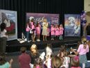 Ashley Tisdale speaks on stage with young Bella Sara fans